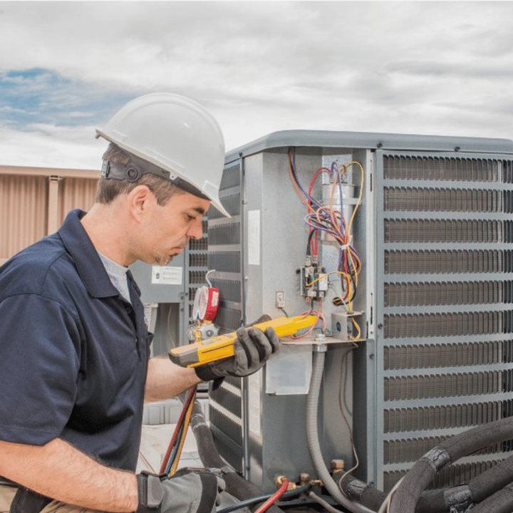 Mitchell HVAC Pros HVAC technician on a service call in Mitchell, Ontario